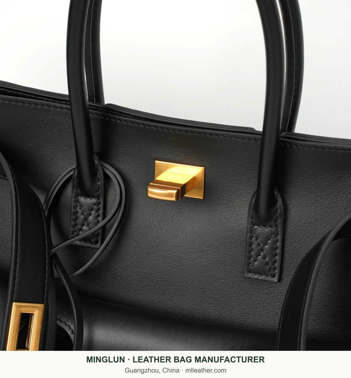 Close-up of tote handles, stitching and gold-tone turn lock. MINGLUN manufacturer watermark at the bottom.