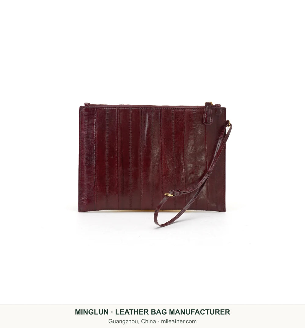 Burgundy eel leather zip pouch with a slim strap. MINGLUN manufacturer watermark at the bottom.