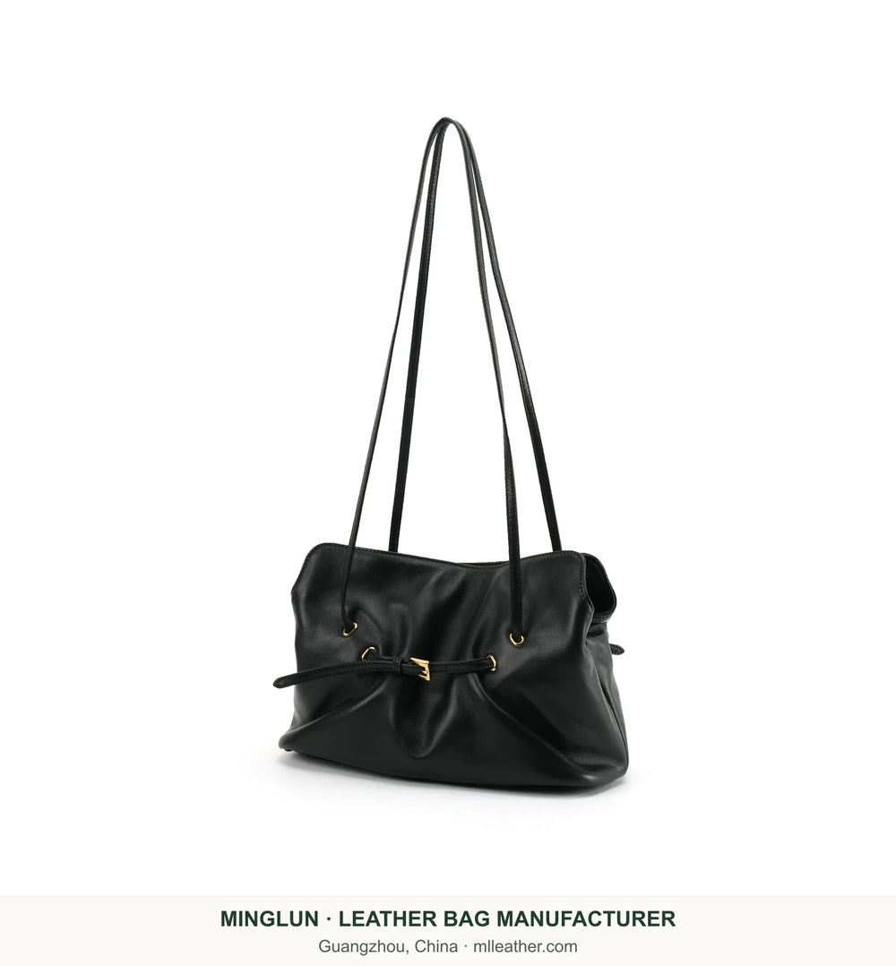 Black gathered sheepskin tote bag with long handles. MINGLUN manufacturer watermark at the bottom.