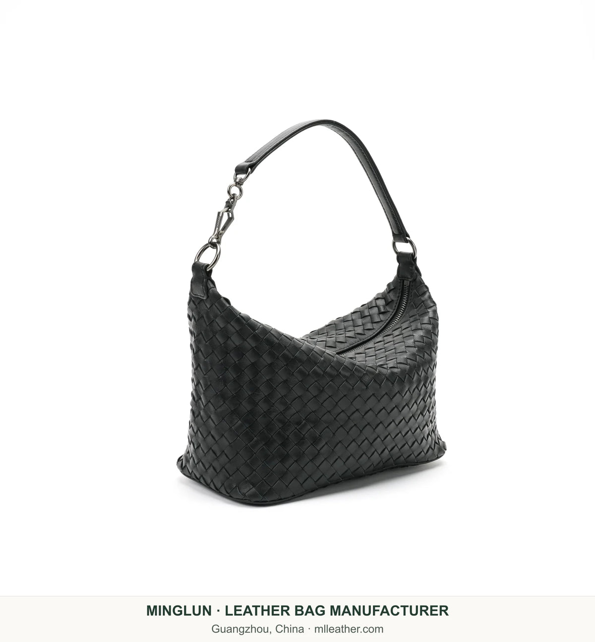 Black handwoven sheepskin shoulder bag, three-quarter view. MINGLUN manufacturer watermark at the bottom.