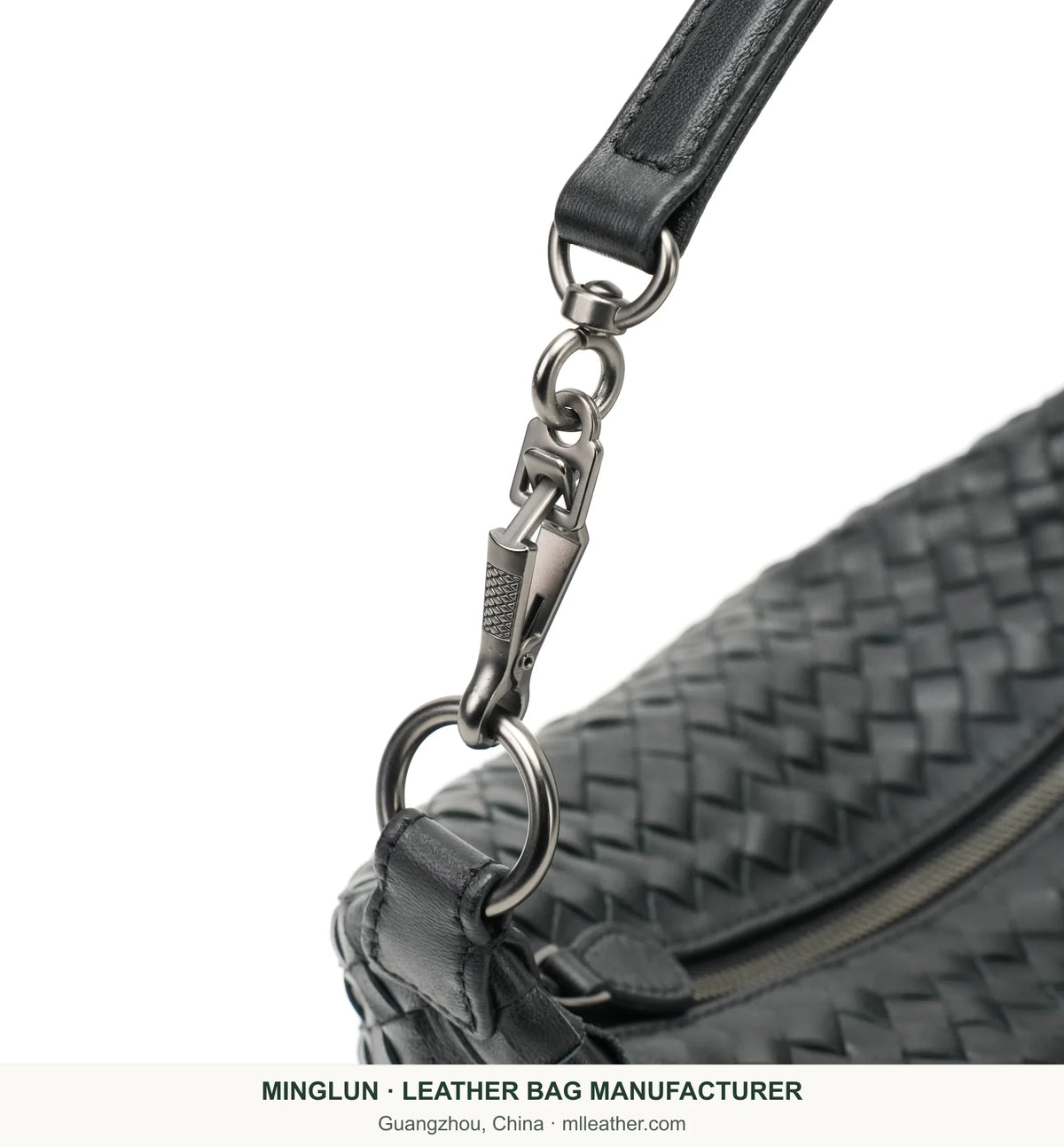 Metal strap clasp on black handwoven sheepskin shoulder bag. MINGLUN manufacturer watermark at the bottom.