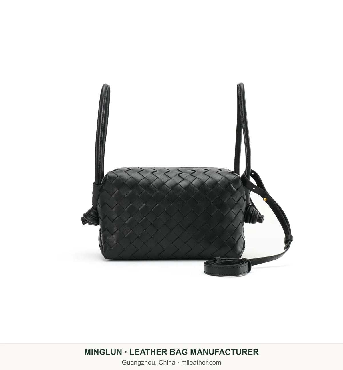 Black handwoven sheepskin bag with twin handles and long strap. MINGLUN manufacturer watermark at the bottom.