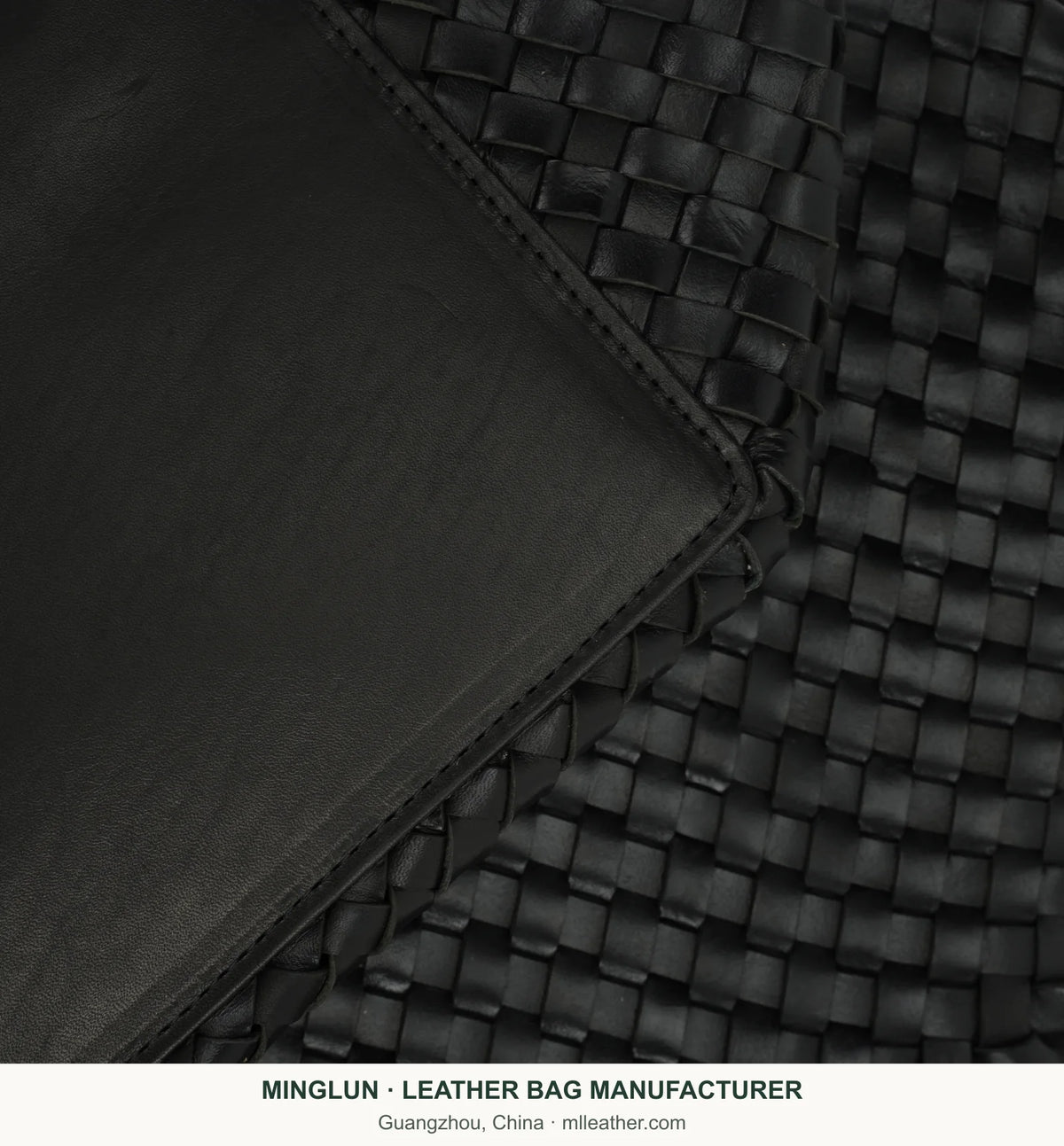 Leather pouch and woven texture detail on black vegetable-tanned leather tote bag. MINGLUN manufacturer watermark at the bottom.