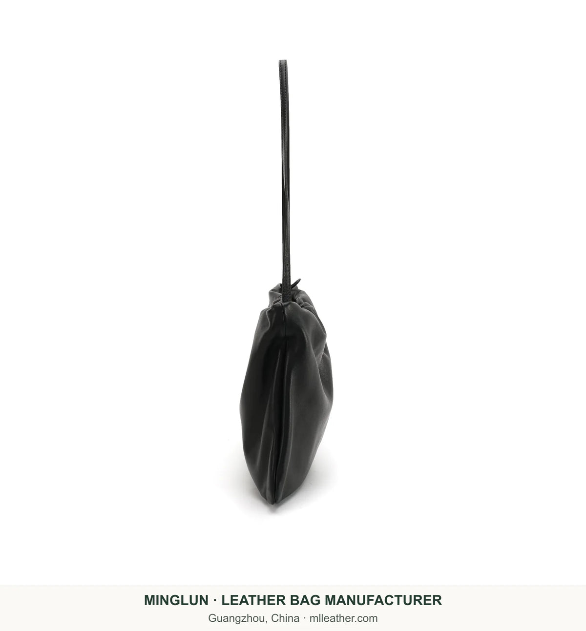 Black sheepskin shoulder bag, side view. MINGLUN manufacturer watermark at the bottom.