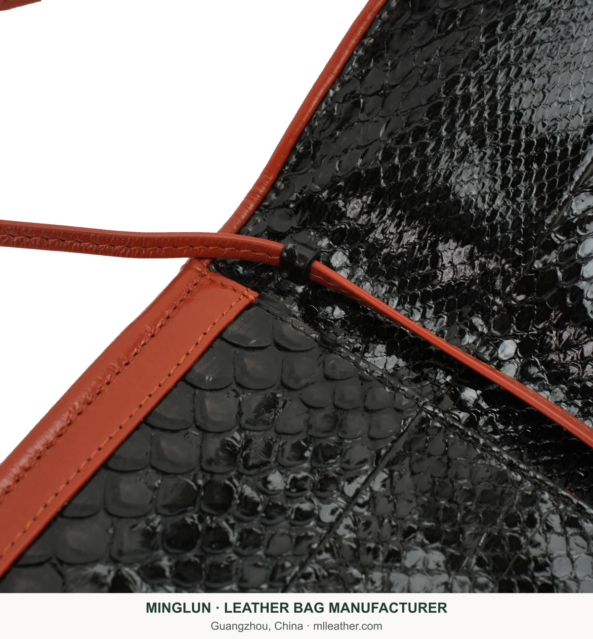 Close-up of strap attachment and black snakeskin surface. MINGLUN manufacturer watermark at the bottom.