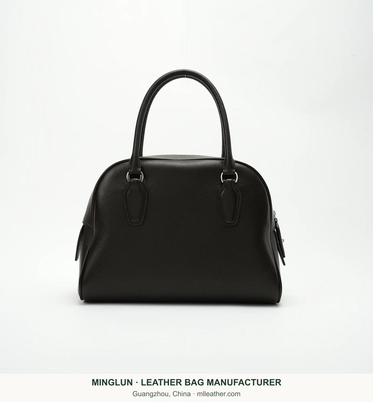 Dark top-grain cowhide bowling bag with twin handles, front view. MINGLUN manufacturer watermark at the bottom.