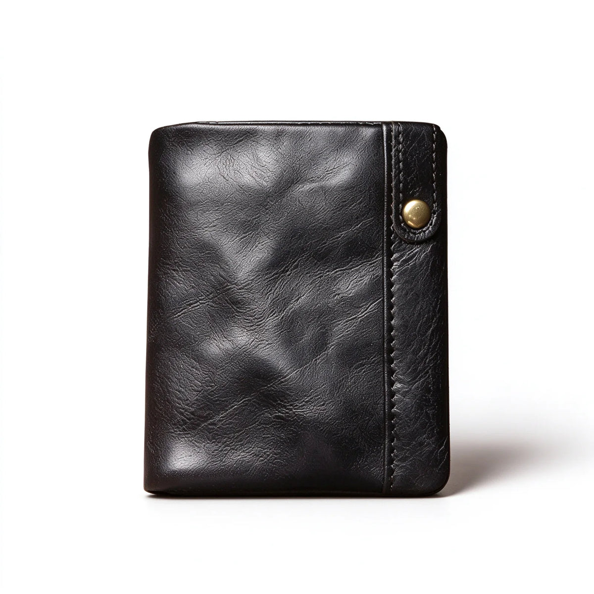 Black leather card and coin wallet standing upright with a slim snap-fastened tab on the front edge.